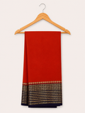 Beautiful Crepe Semi Silk Saree with Striking Combination Of Orange  with Purple and gold border, giving it a Regal and Elegant look.