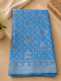 Elegant sky blue Cotton saree featuring intricate silver paisley motifs and delicate detailing with silver border