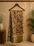 Elegant olive green saree featuring an all-over floral print in soft pink and beige tones, beautifully complemented by a rich golden woven border. - Satin Tissue Saree