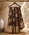 Elegant brown saree adorned with graceful ivory floral prints with Rich zari woven border - Fancy Saree.