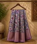 Elegant bluish-grey saree featuring graceful floral prints in soft lavender and beige tones with zari woven border - Fancy Saree Cotton Mix Satin Finish.