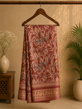 Elegant dusty rose saree featuring an all-over floral print and a rich golden woven border - Satin Tissue Saree