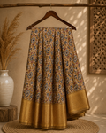 Elegant  beige-gold saree adorned with classic paisley and floral prints with zari woven border - Fancy Saree Cotton Mix Satin Finish.