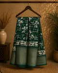 Elegant bottle green saree features a graceful white floral and abstract print and a beautifully Zari border - Cotton tissue soft Saree