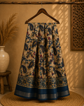 Elegant cream-colored saree featuring beautiful blue paisley and floral prints and silver zari line border - Cotton silk soft Saree