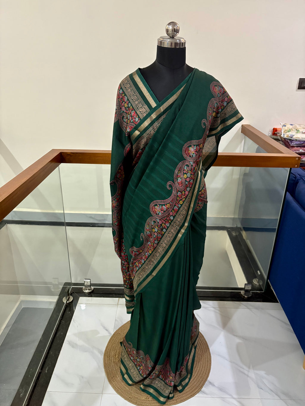 legant Heritage Inspired Saree With Traditional Motifs Comes With Green , Pink and Gold Zari Border Combination.
