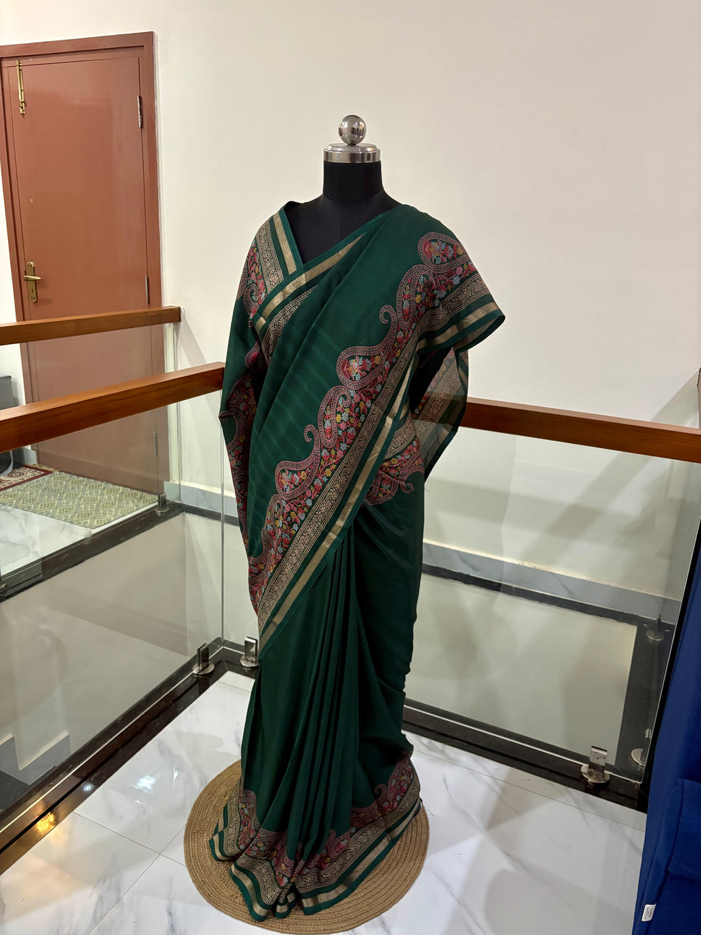 legant Heritage Inspired Saree With Traditional Motifs Comes With Green , Pink and Gold Zari Border Combination.