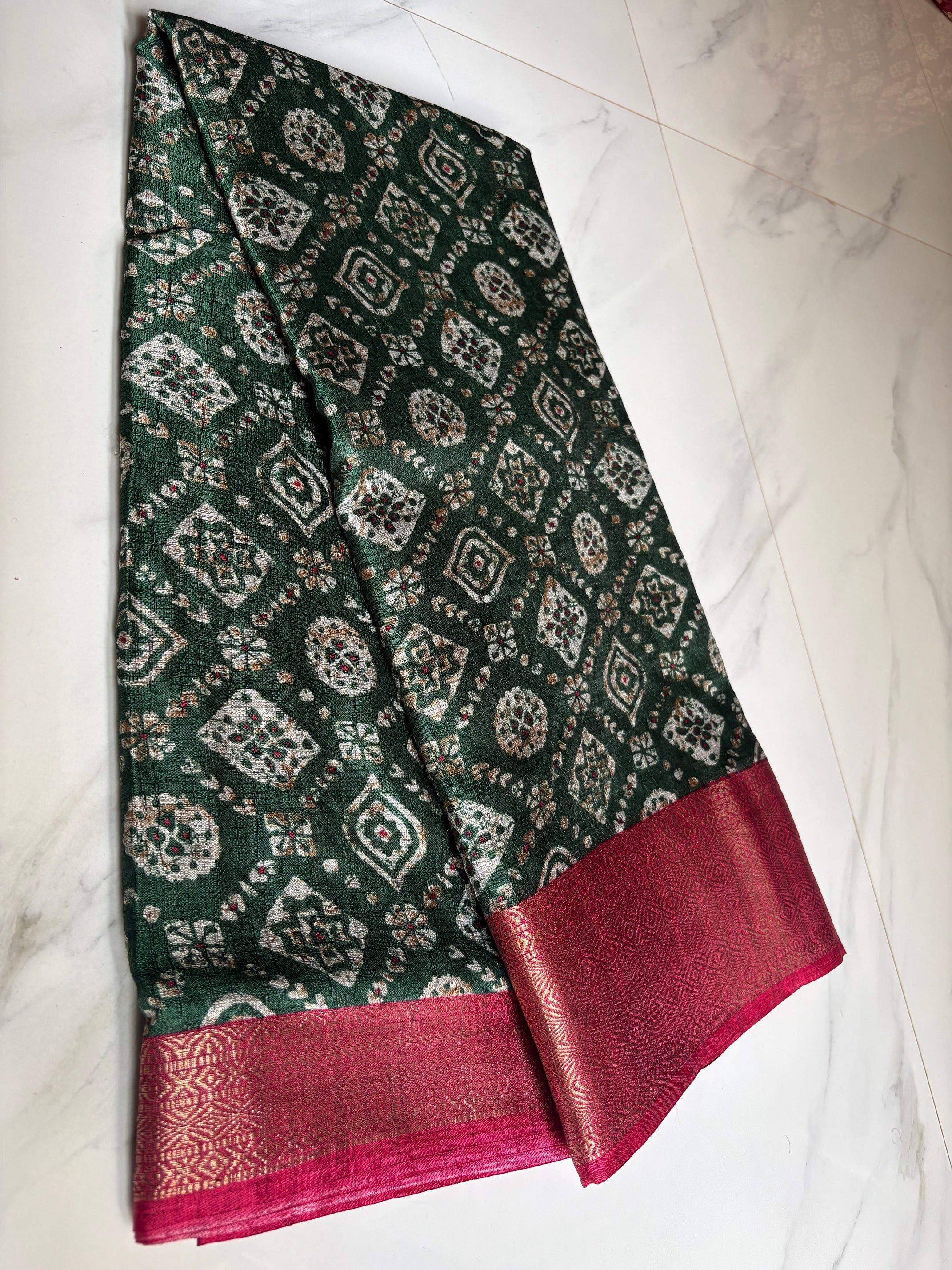 Beautiful Dark Green Saree Featuring Geometric and Floral Motifs with Rich Contrast Pink Weaving Zari Border