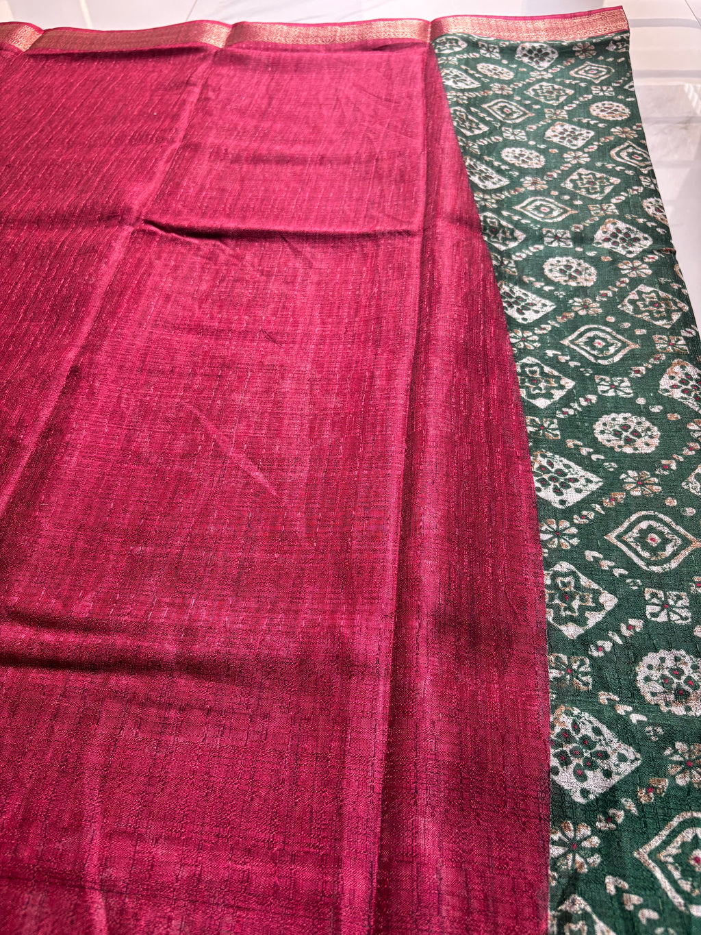 Beautiful Dark Green Saree Featuring Geometric and Floral Motifs with Rich Contrast Pink Weaving Zari Border