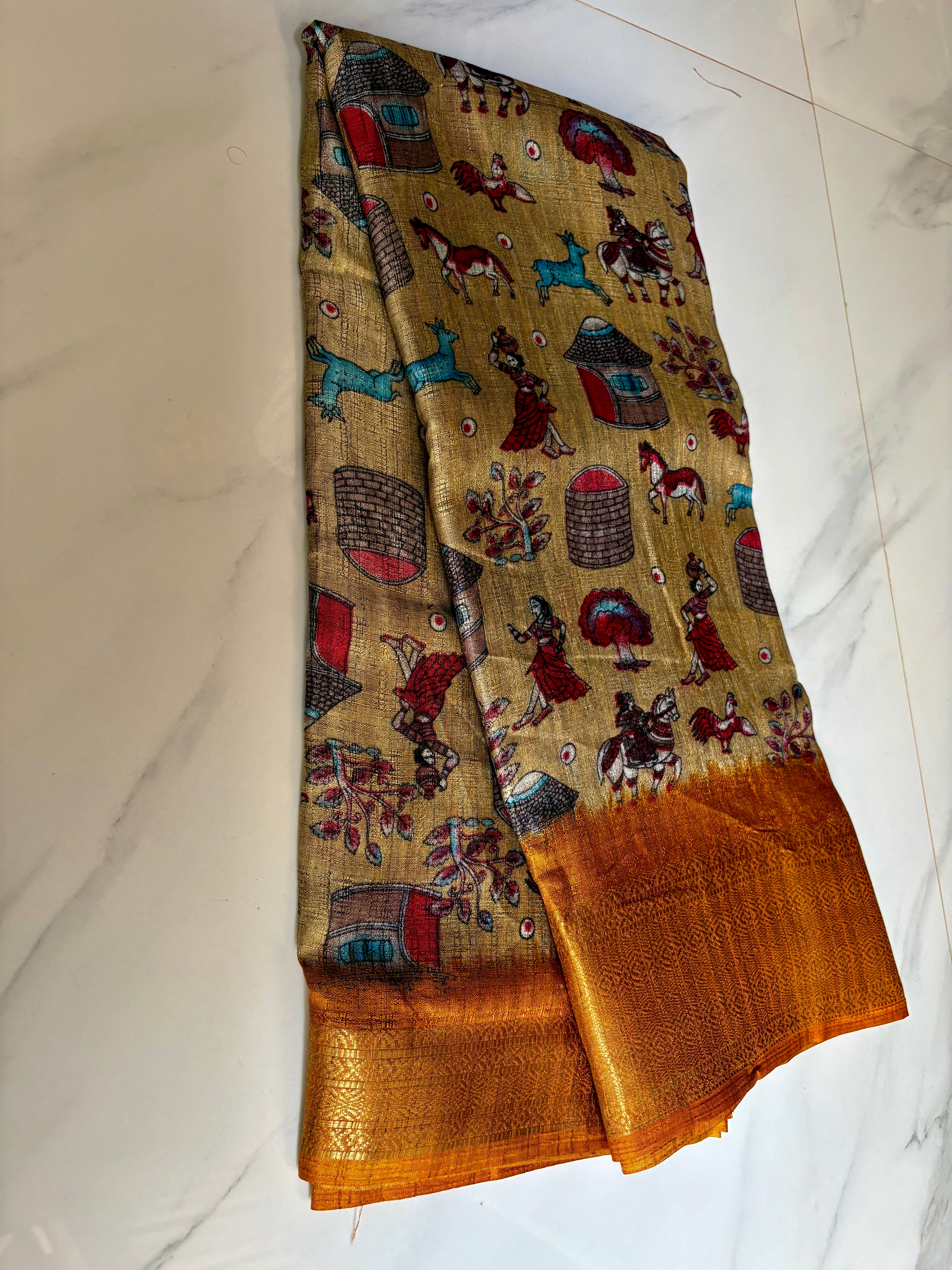 Beautiful Beige Khadi Cotton Saree Featuring vibrant traditional village-life and folk art prints with Rich golden zari woven border