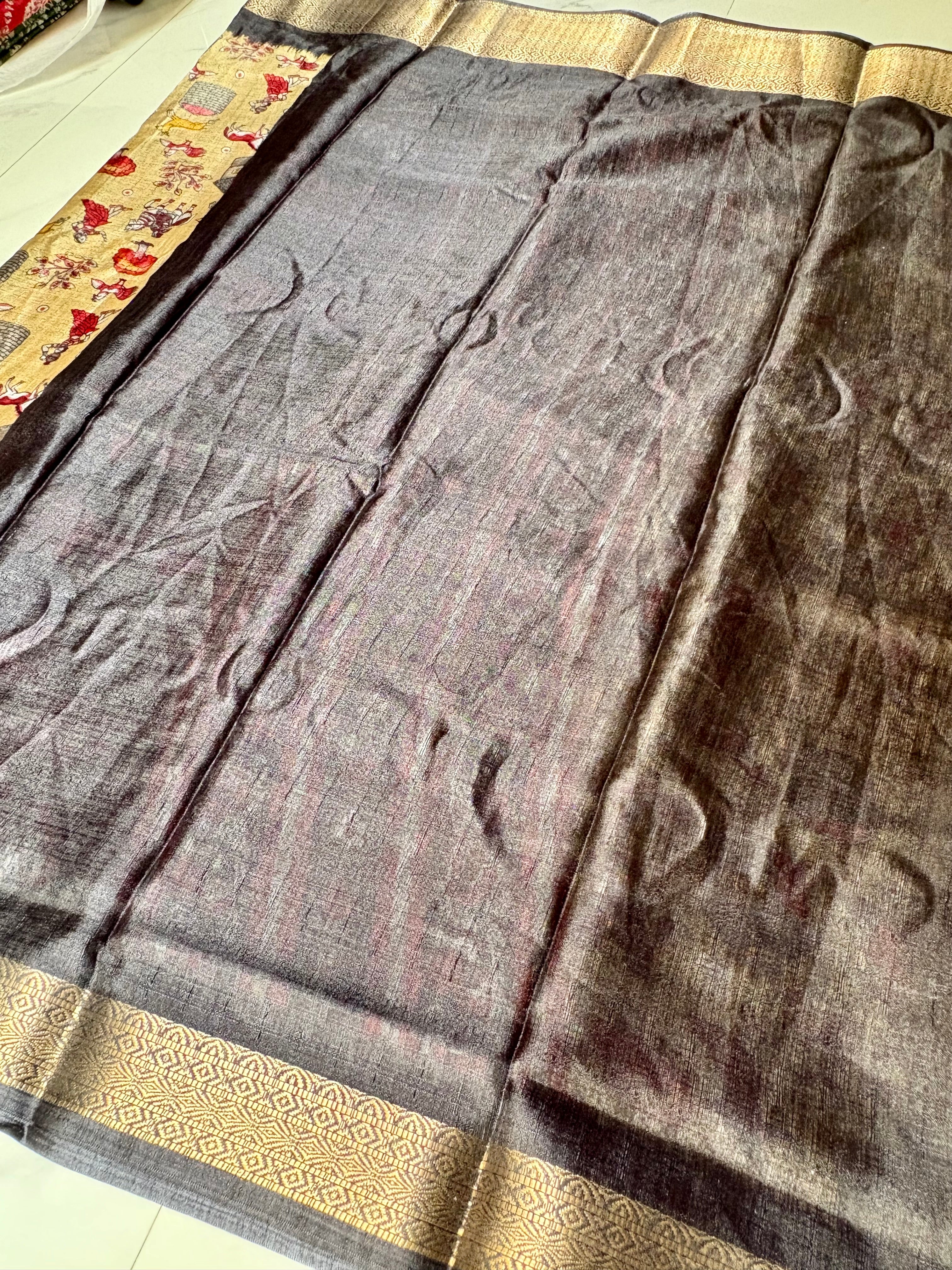Beautiful Beige Khadi Cotton Saree Featuring vibrant traditional village-life and art prints with Rich Black zari woven border