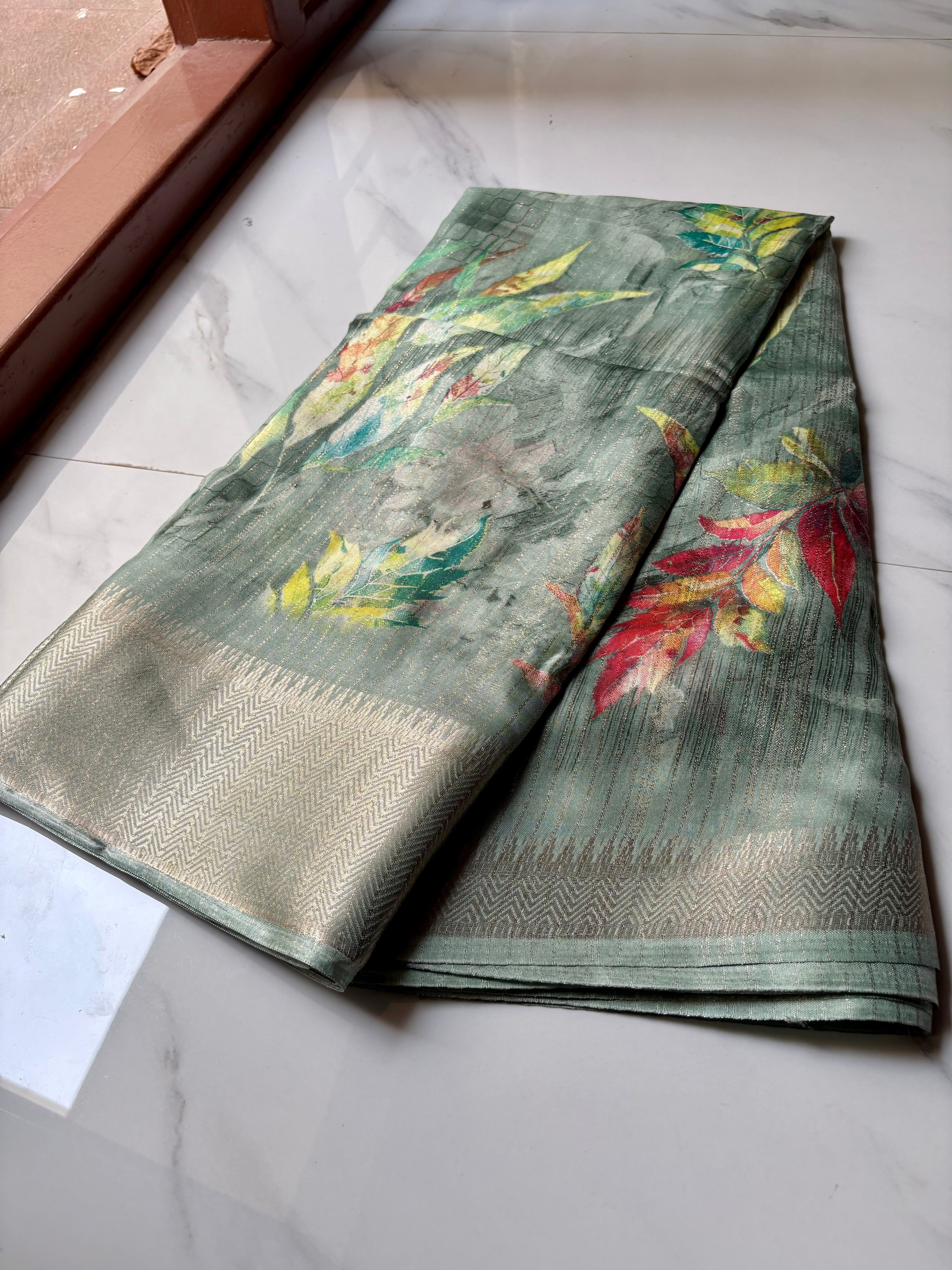 Elegant Sage Green saree adorned with Leaf prints with zari woven border - Fancy Saree Cotton Mix Satin Finish.