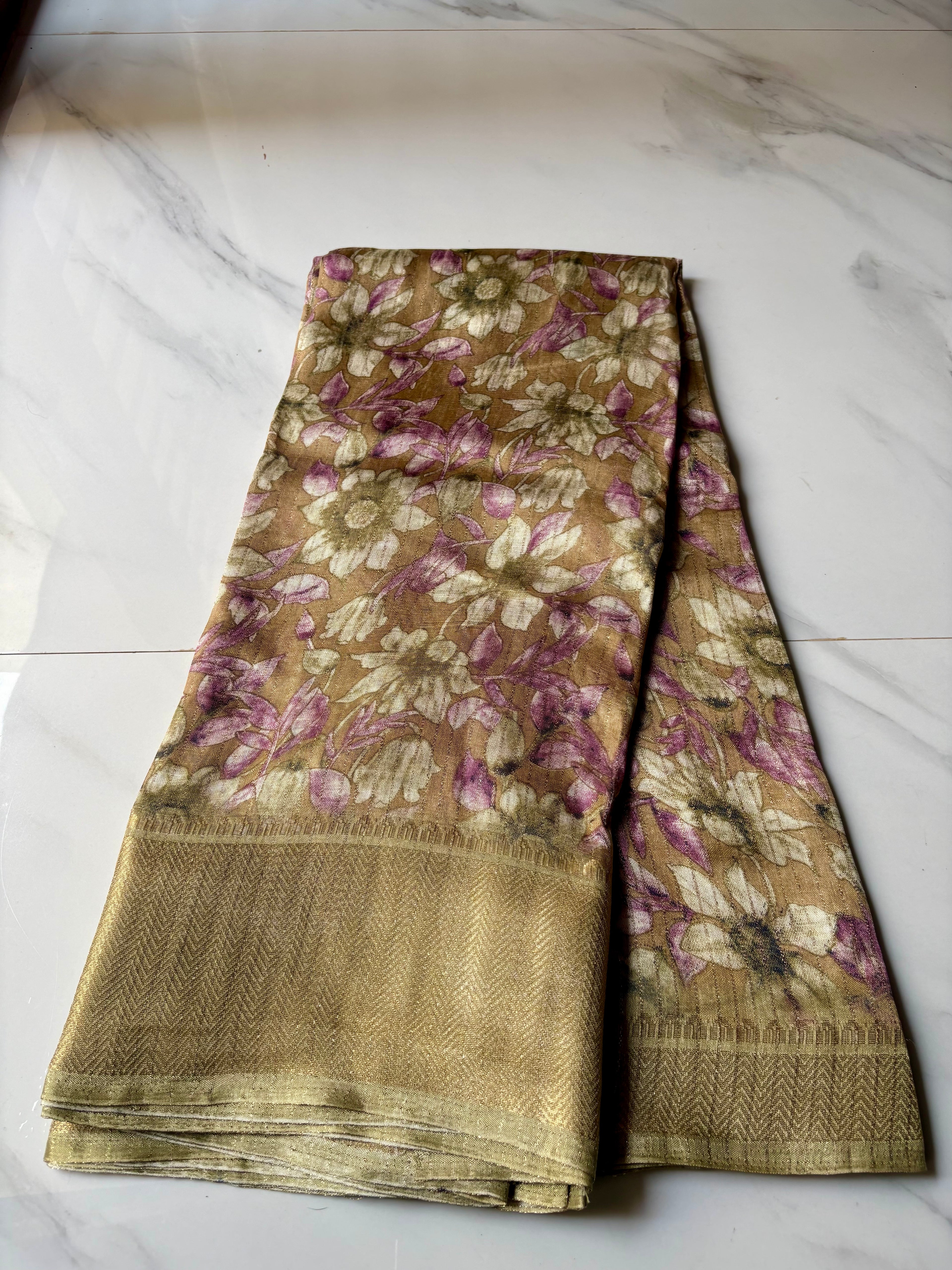 Elegant  beige-gold saree featuring soft floral prints in pastel pink and ivory with zari woven border - Fancy Saree Cotton Mix Satin Finish.