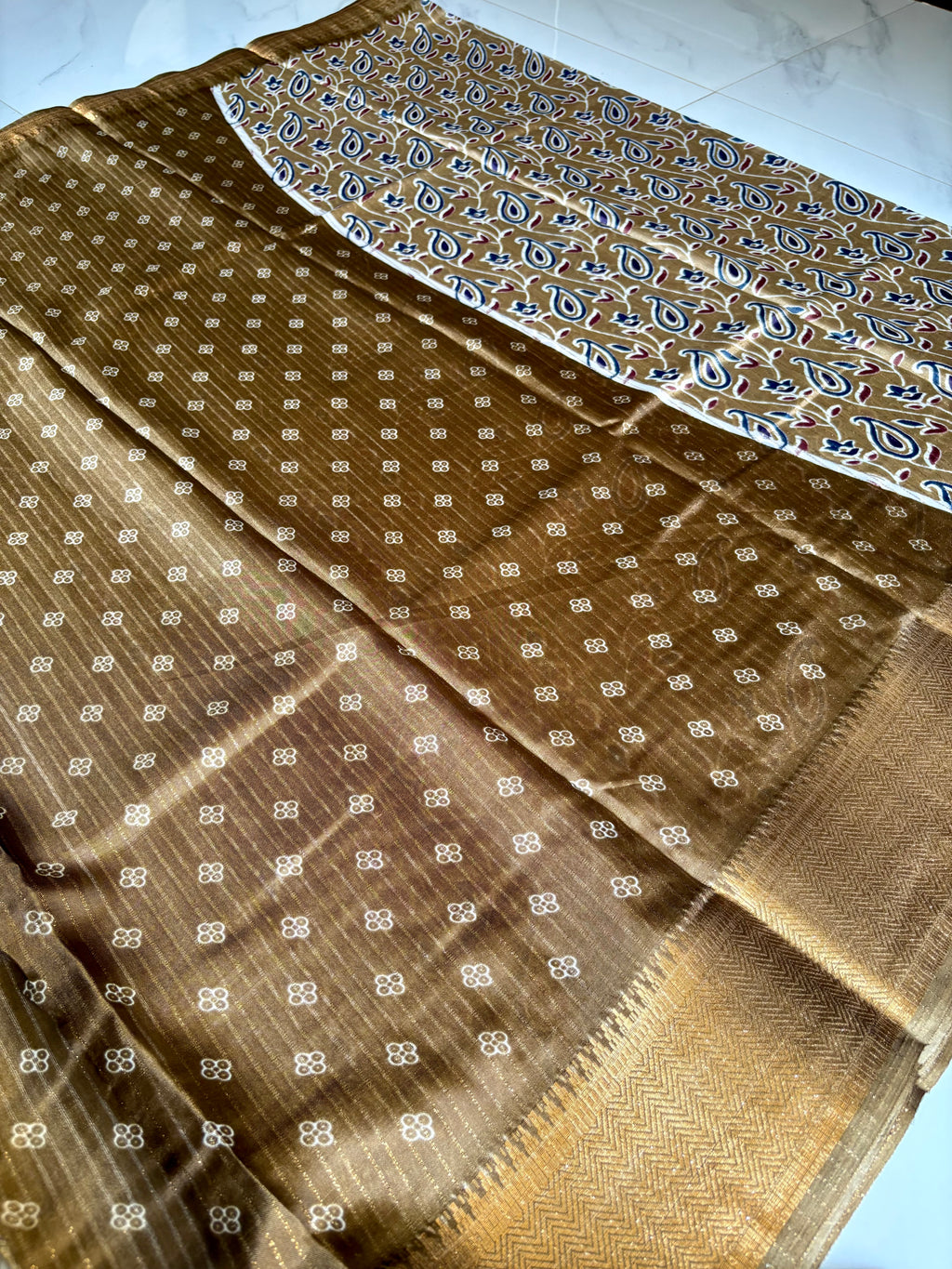 Elegant  beige-gold saree adorned with classic paisley and floral prints with zari woven border - Fancy Saree Cotton Mix Satin Finish.