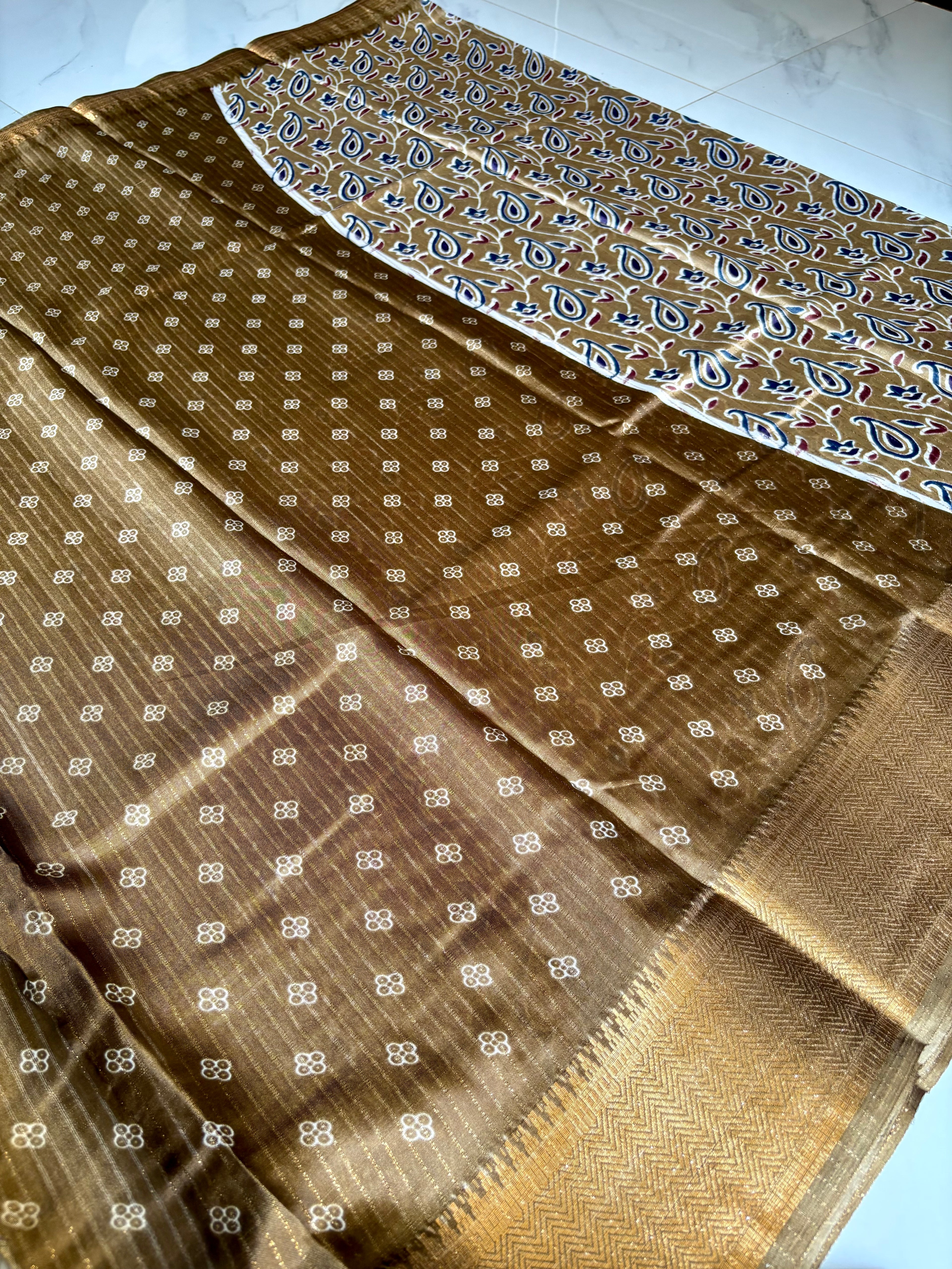 Elegant  beige-gold saree adorned with classic paisley and floral prints with zari woven border - Fancy Saree Cotton Mix Satin Finish.