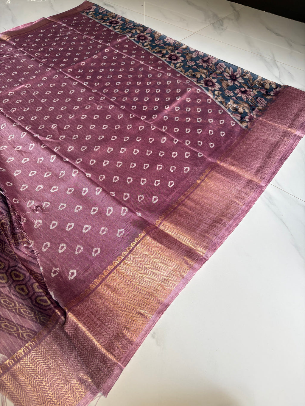 Elegant bluish-grey saree featuring graceful floral prints in soft lavender and beige tones with zari woven border - Fancy Saree Cotton Mix Satin Finish.
