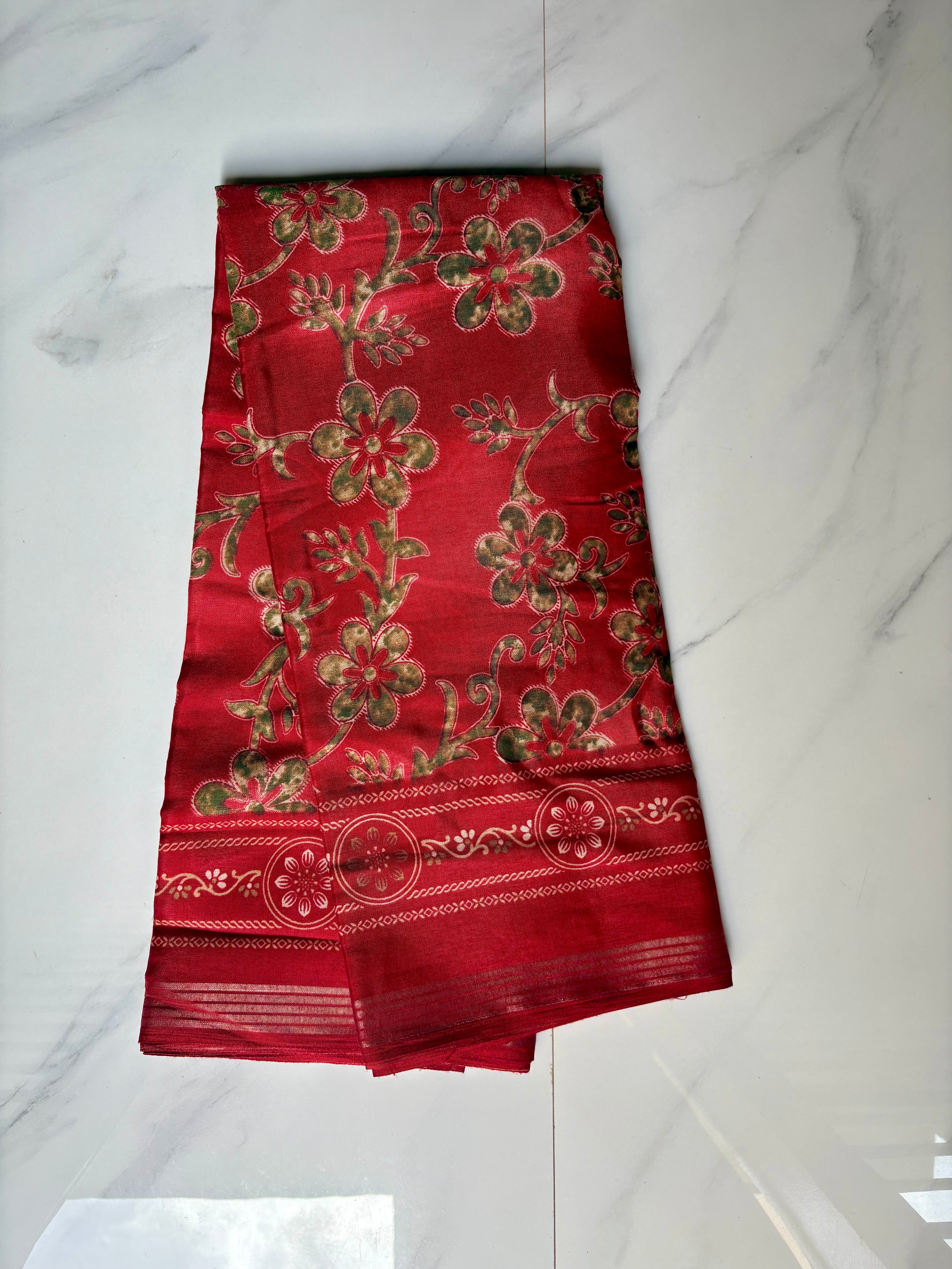 Graceful red saree adorned with elegant floral prints and a beautifully detailed Zari Line border- Cotton silk soft Saree