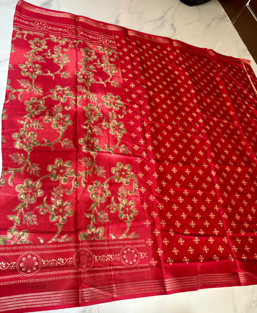 Graceful red saree adorned with elegant floral prints and a beautifully detailed Zari Line border- Cotton silk soft Saree