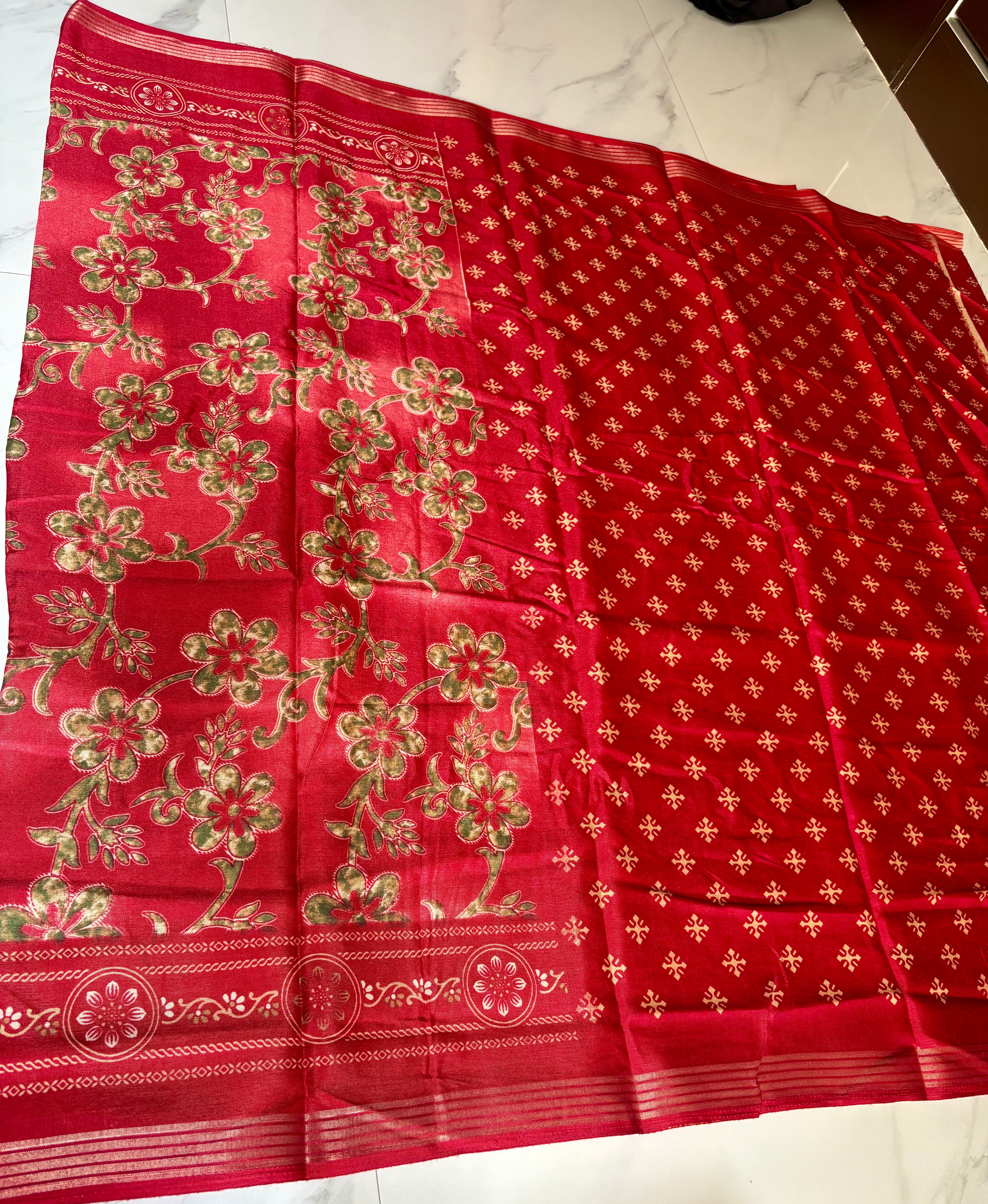 Graceful red saree adorned with elegant floral prints and a beautifully detailed Zari Line border- Cotton silk soft Saree