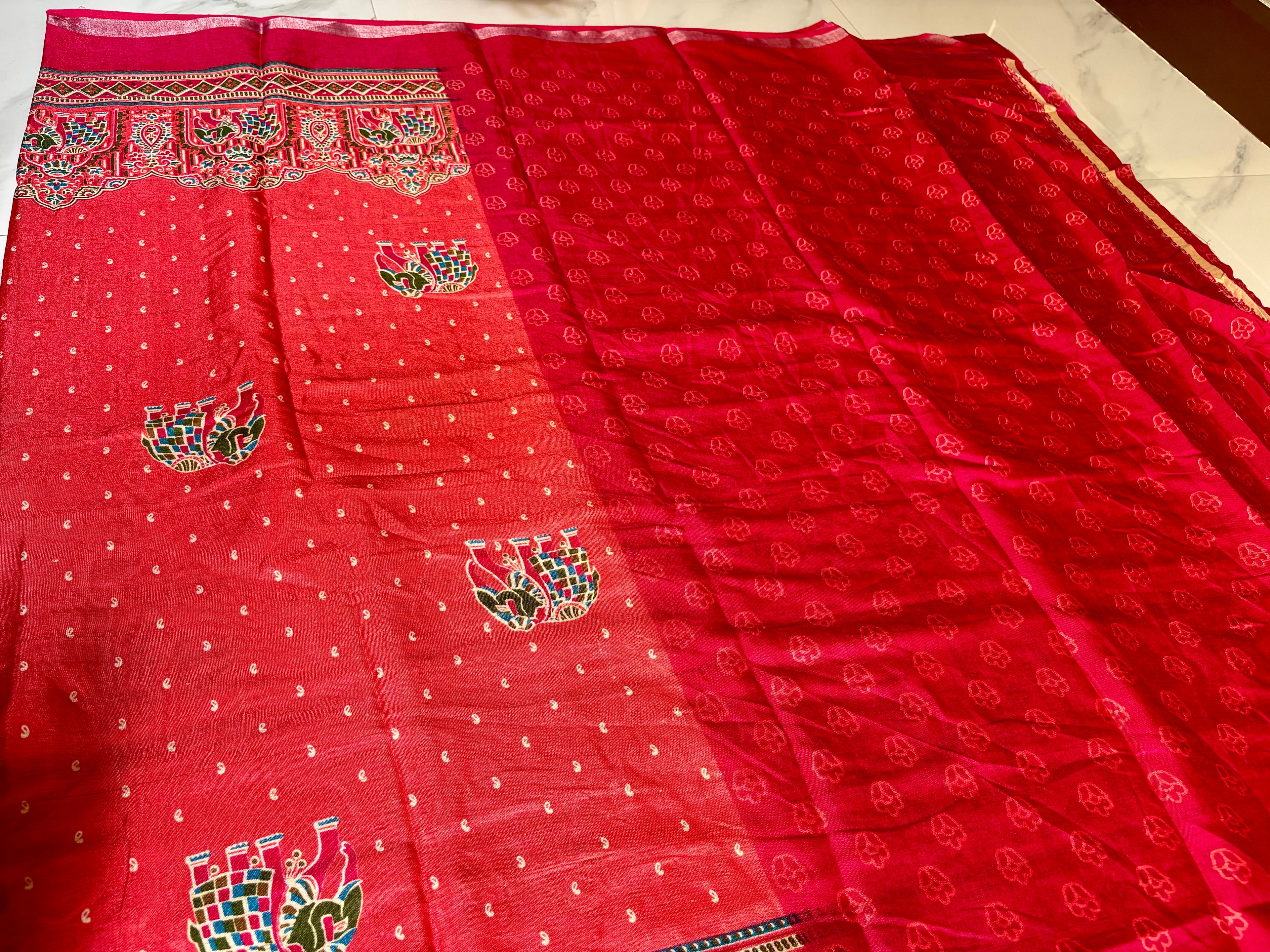 Gracefully designed in a rich rani pink shade, this saree features elegant elephant and heritage-inspired temple motifs Zari Line border- Cotton silk soft Saree