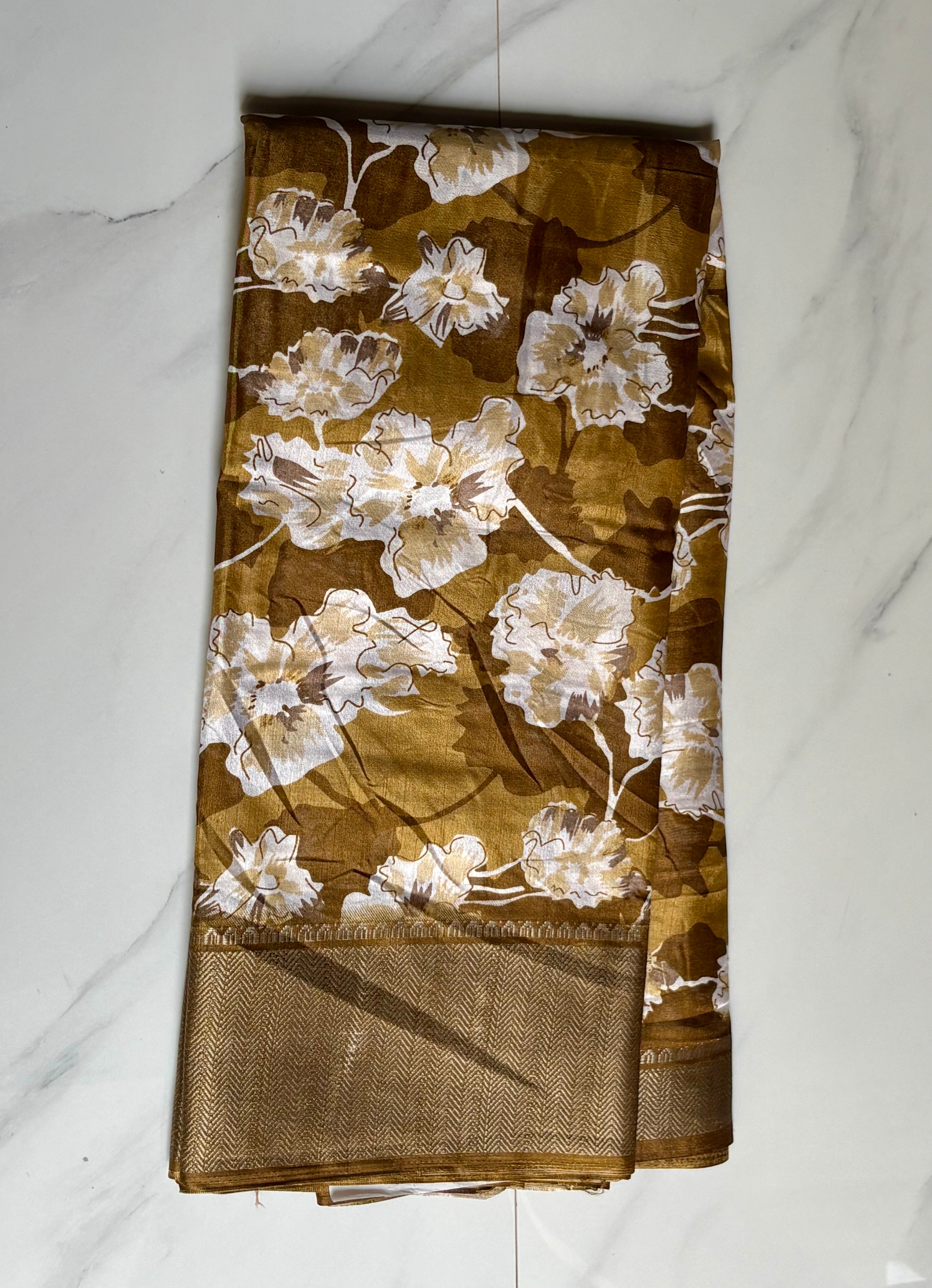 Elegant Brown- Green floral printed saree featuring soft ivory floral motifs and a beautifully designed Zari border - Cotton tissue soft Saree