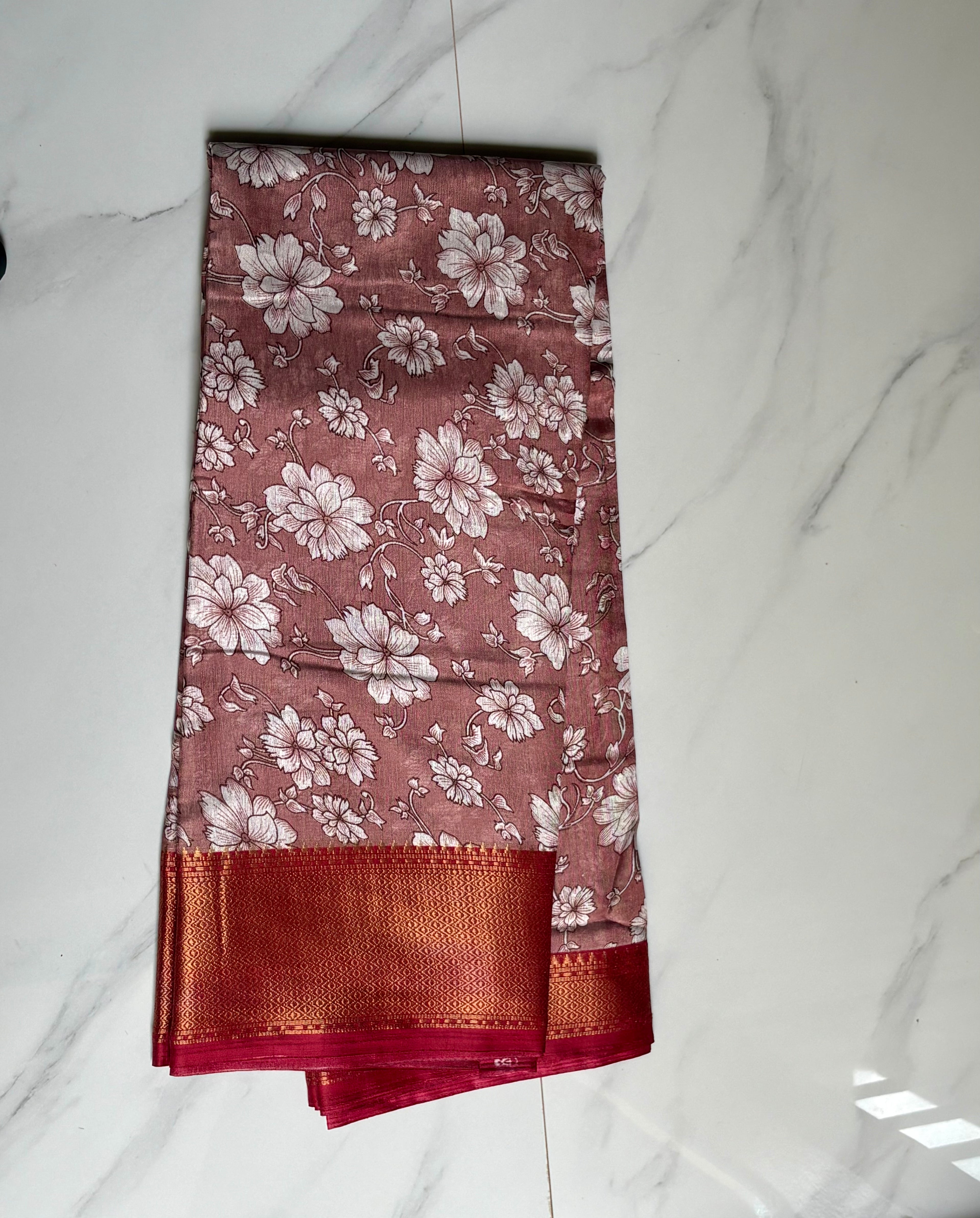 Elegant dusty rose saree featuring delicate white floral prints and a rich maroon zari border - Cotton tissue soft Saree