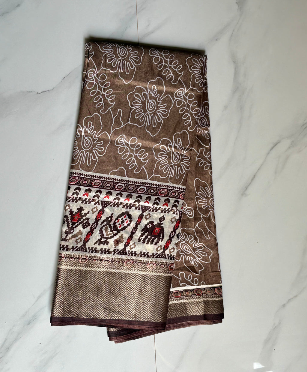 Elegant Light brown saree featuring a stylish white floral outline print with a beautifully ethnic border - Cotton tissue soft Saree