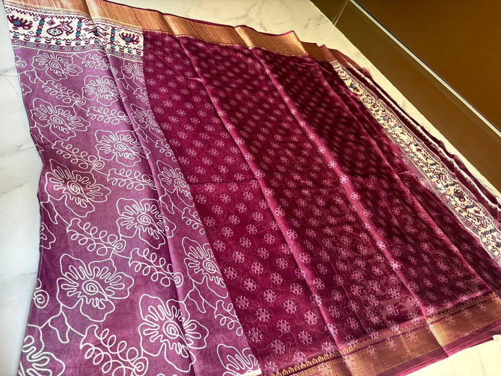 Elegant purple saree featuring graceful floral line prints and a striking ethnic-inspired border - Cotton tissue soft Saree (Copy)