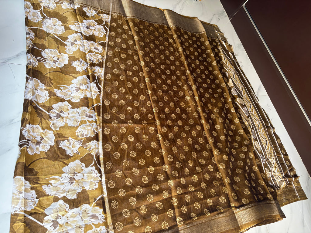 Elegant Brown- Green floral printed saree featuring soft ivory floral motifs and a beautifully designed Zari border - Cotton tissue soft Saree