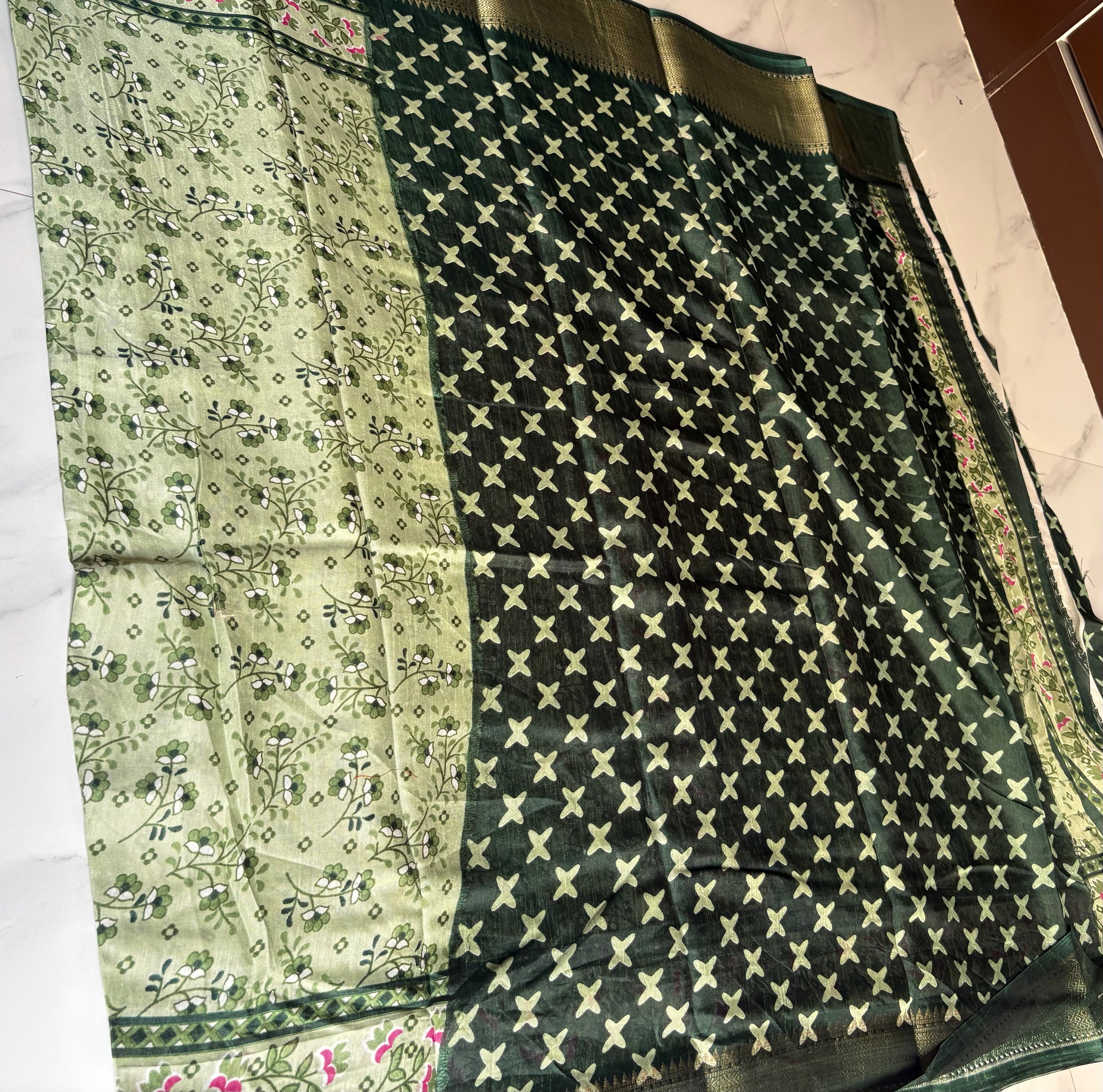 Elegant light green saree featuring delicate floral vine prints and a beautifully designed floral Zari border - Cotton tissue soft Saree