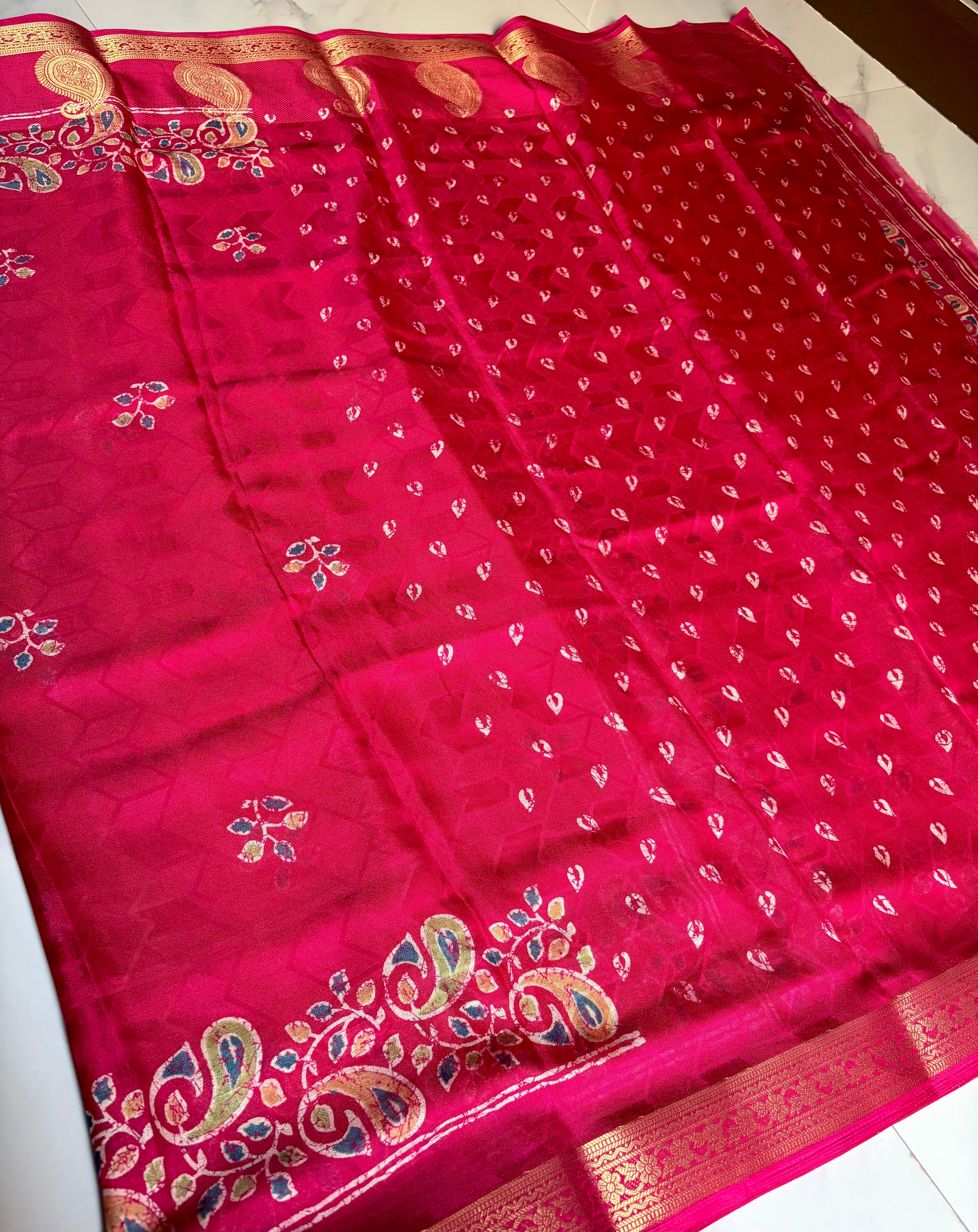Elegant Rani Pink saree, featuring delicate floral print and beautifully woven golden zari border - Foil Georjjett jacquard Saree