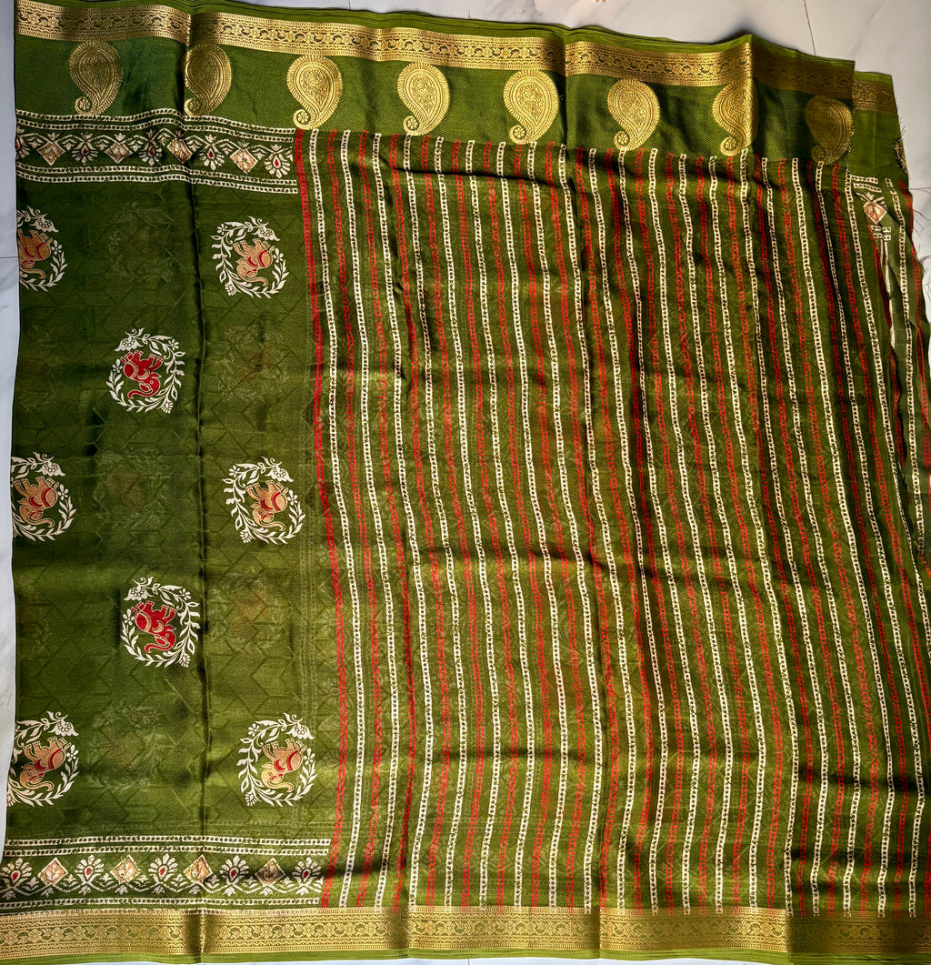 Elegant olive green shade, this saree features elephant motifs with delicate floral accents and a rich golden zari woven border - Foil Georjjett jacquard Saree
