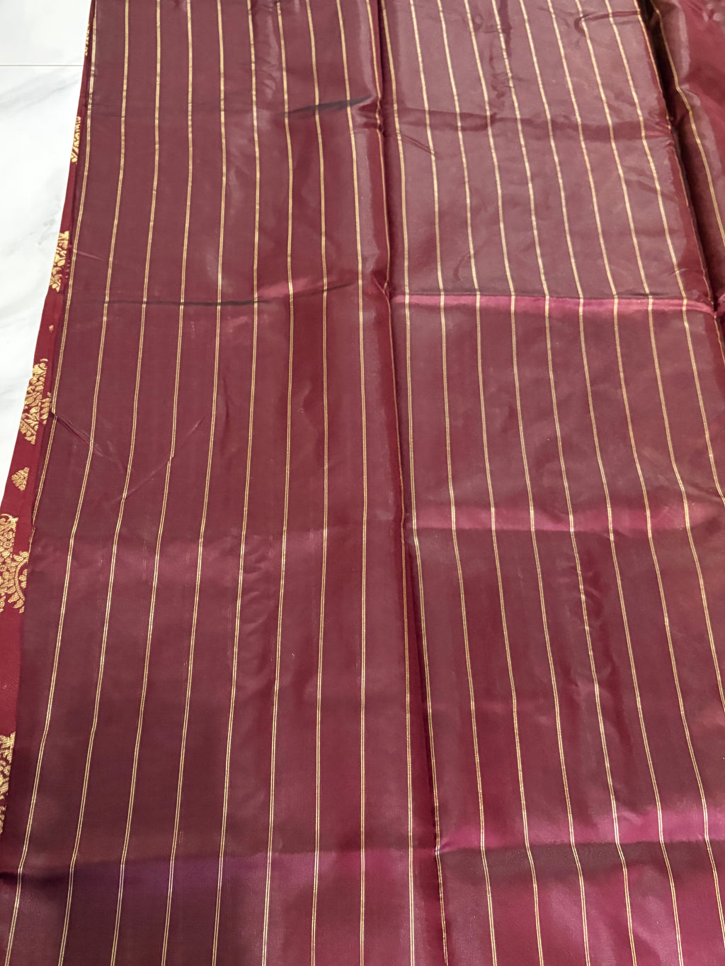 Beautiful Lichi Silk Maroon Saree with Gold Zari Border -  Traditional Motifs