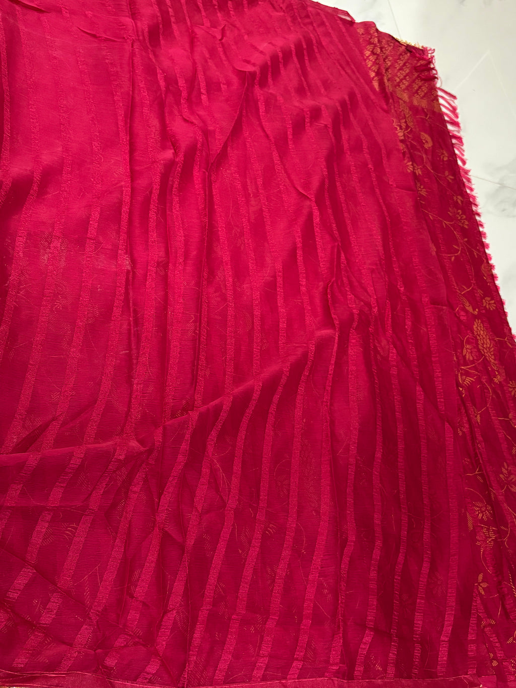 Elegant Deep Red Georgette Saree with Golden Floral design and Border with Tassel