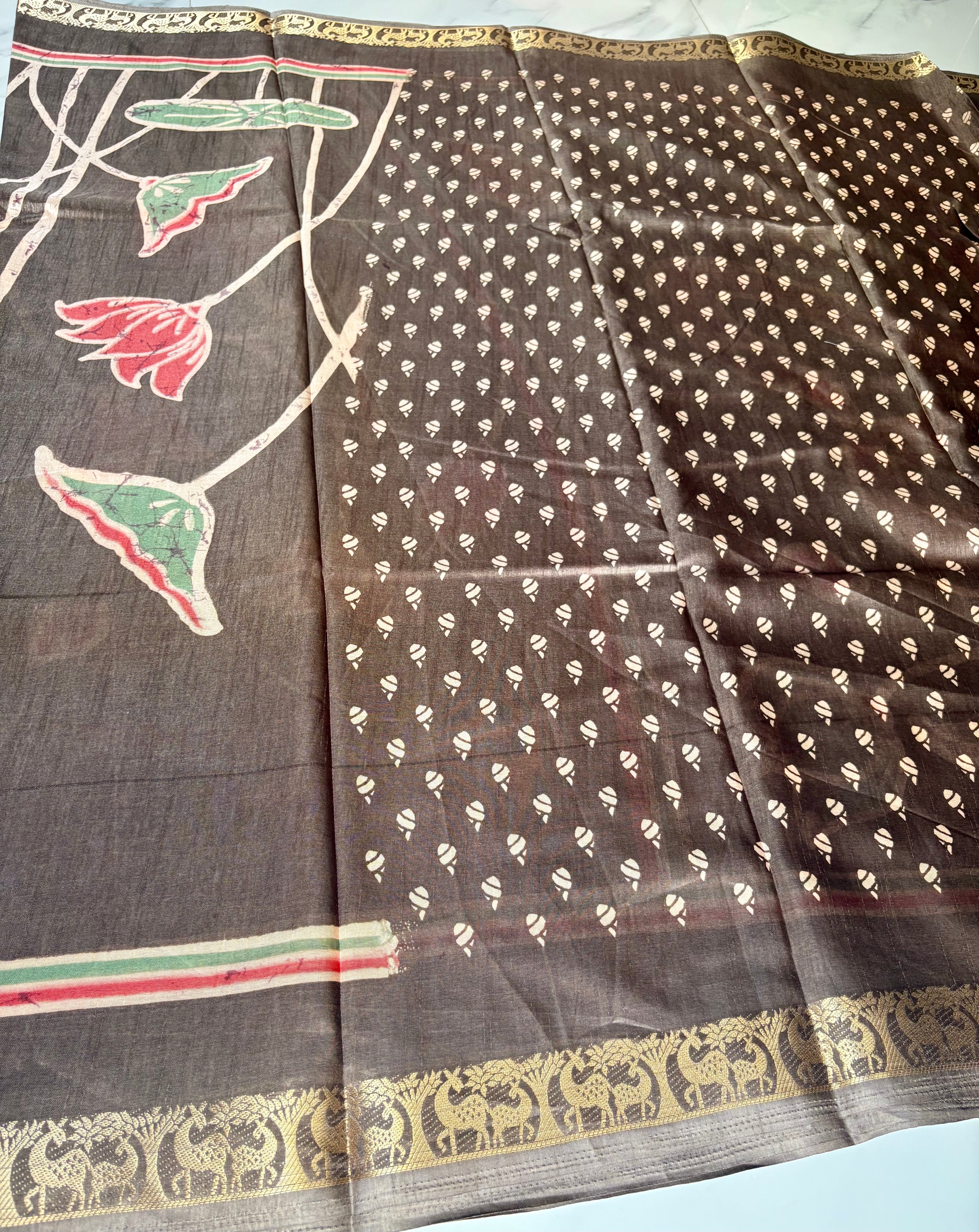 Elegant grey saree featuring a graceful lotus floral print with a beautiful golden motif border - Satin Tissue Saree (Copy)