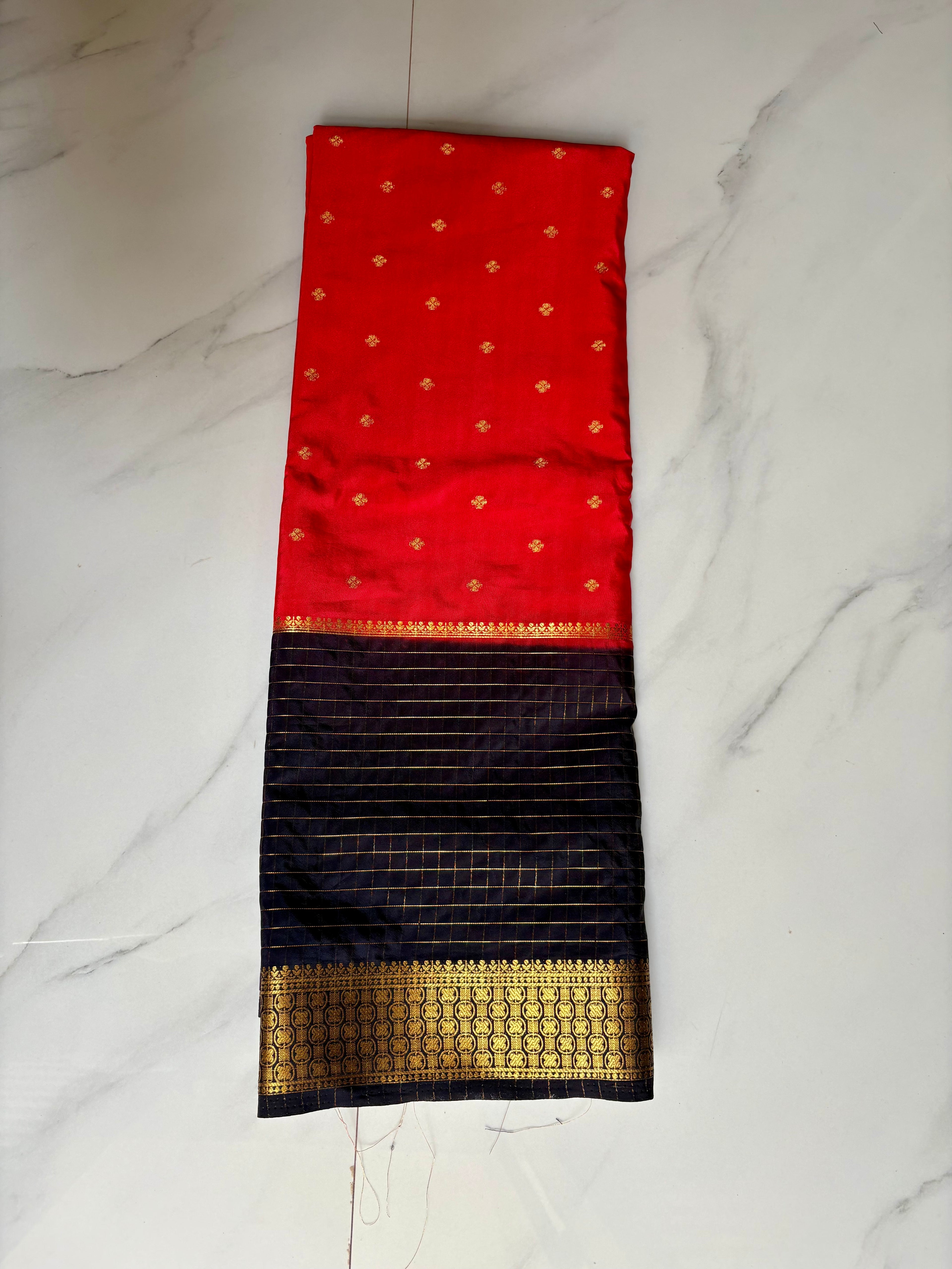 Premium Crape Chex Patti Saree with Orange and Black Colour Combination and Premium Woven Zari Border.