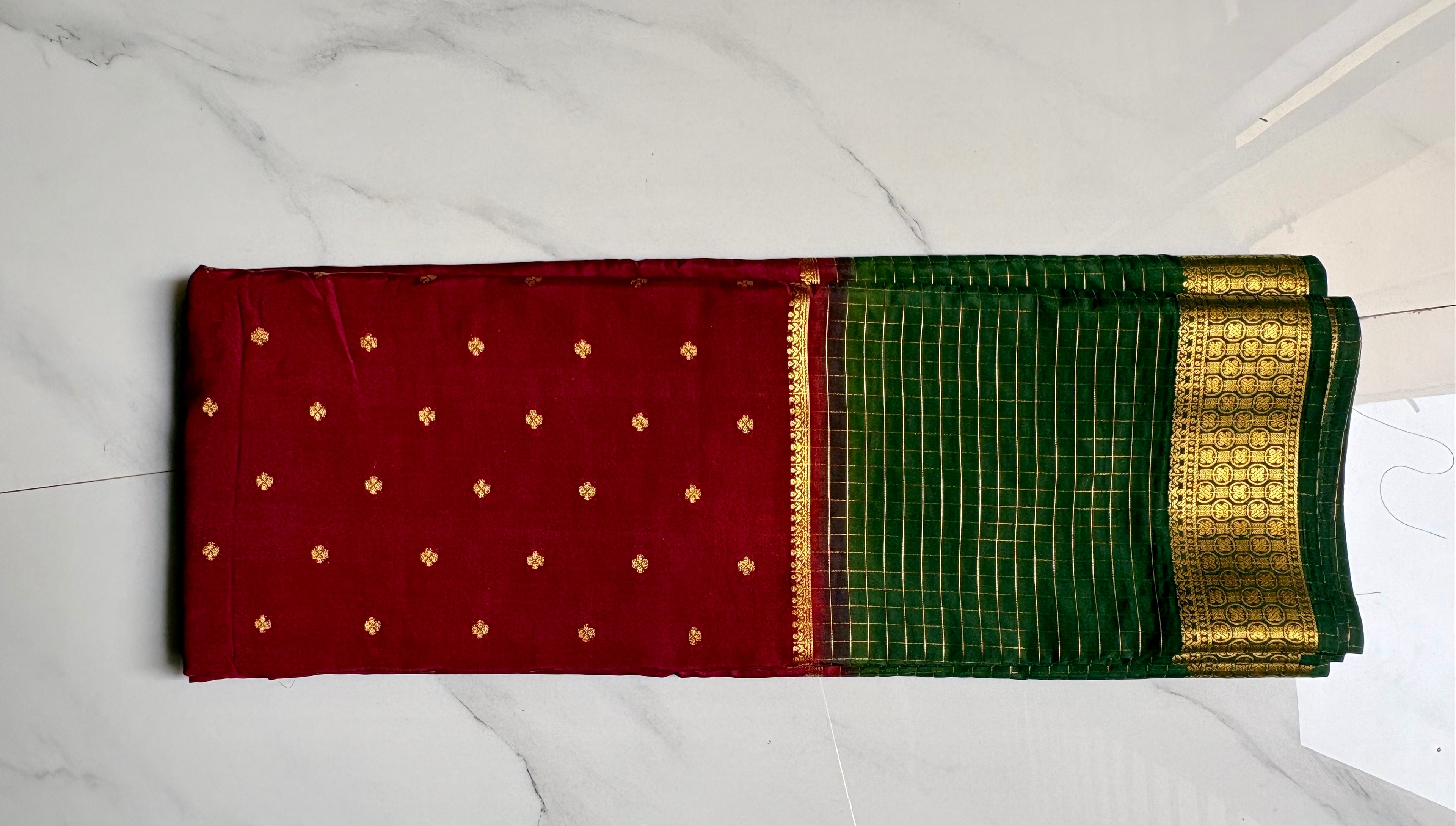 Premium Crape Chex Patti Saree with Maroon and Green Colour Combination and Premium Woven Zari Border.