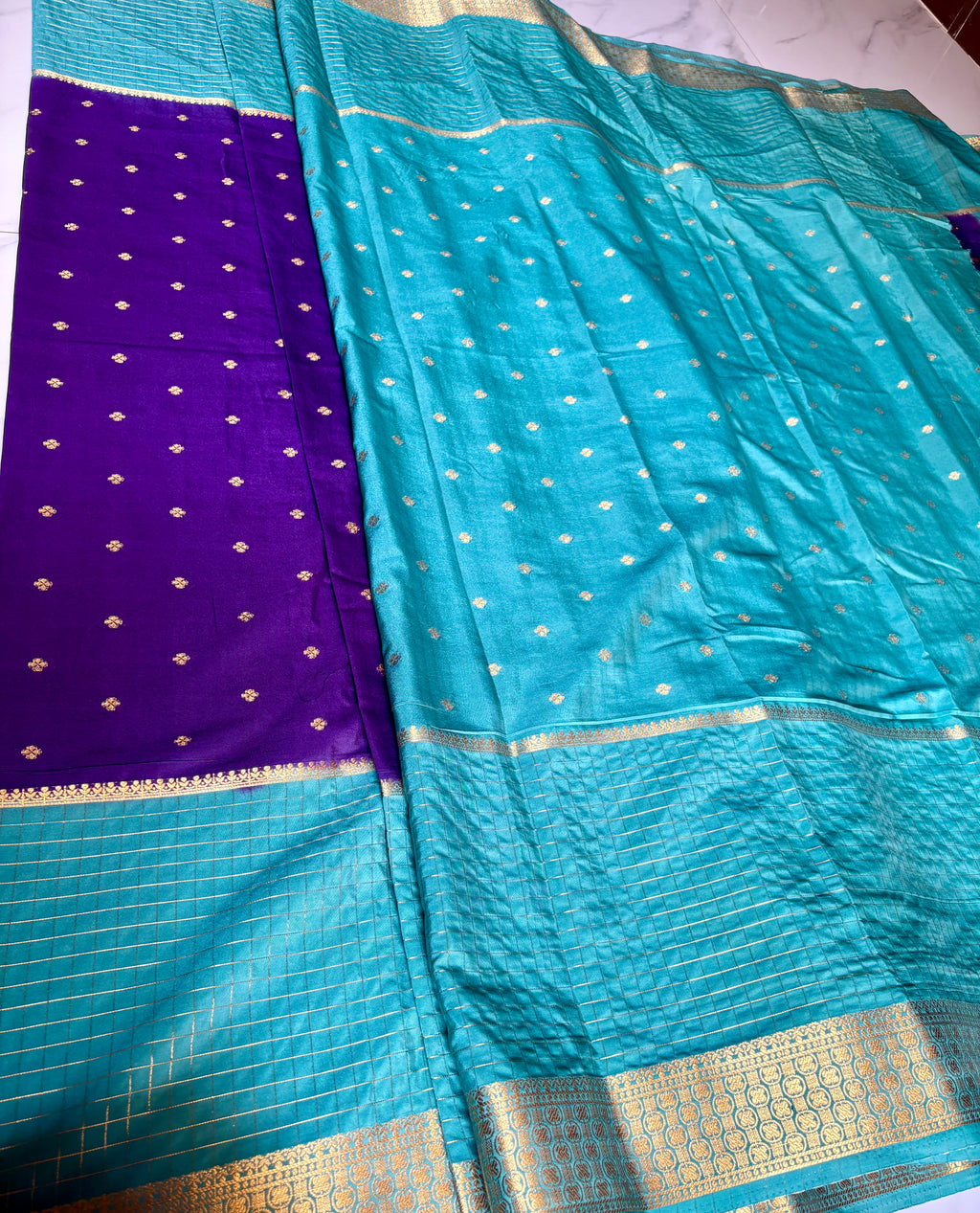 Premium Crape Chex Patti Saree with Purple and Teal Colour Combination and Premium Woven Zari Border.