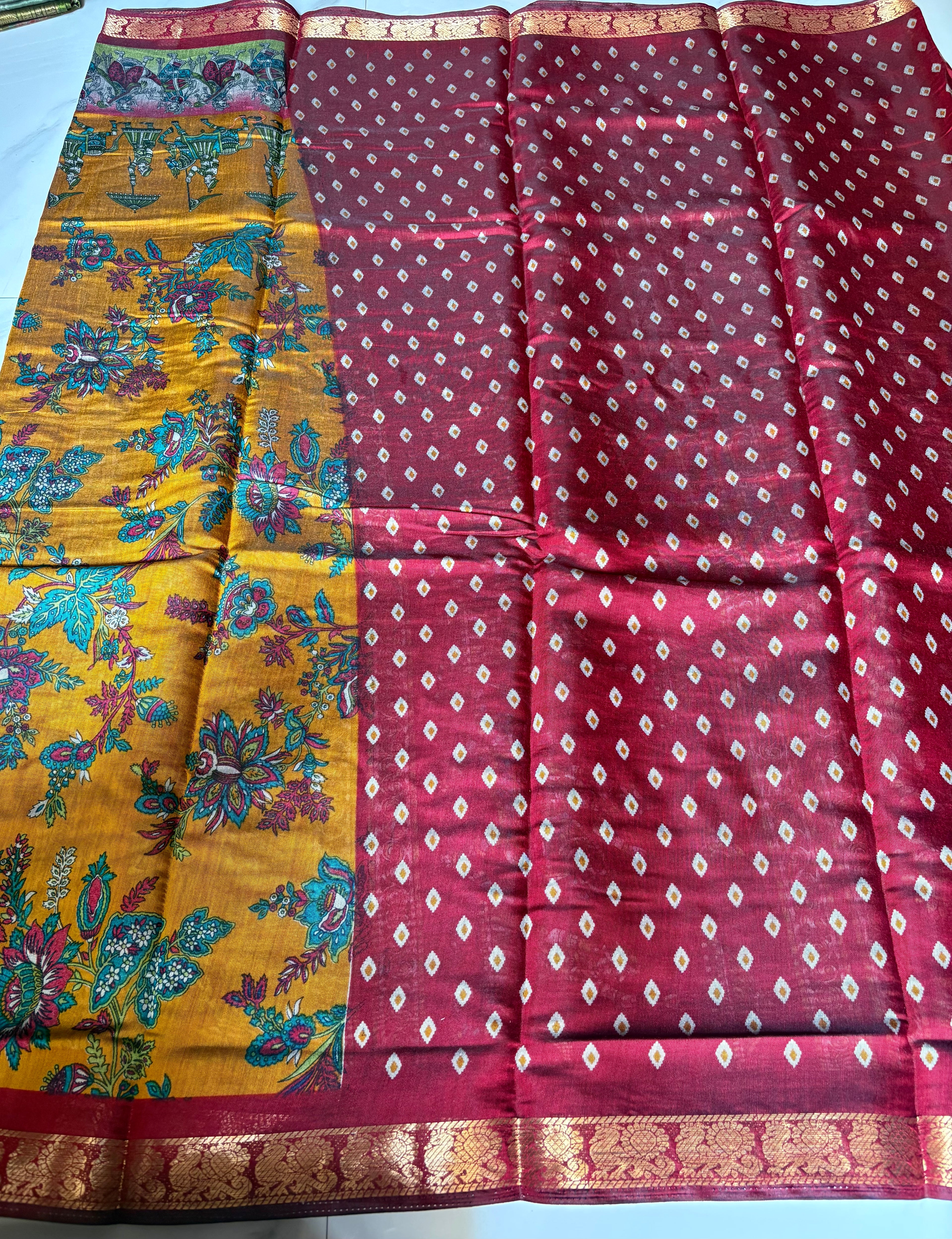 Elegant mustard brown saree, with vibrant floral prints and detailed heritage-inspired with a rich zari border