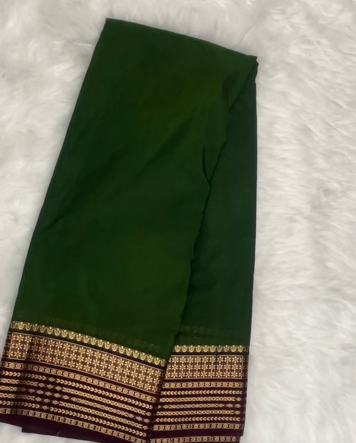 Beautiful Crepe Semi Silk Saree with Striking Combination Of Green with Brown and gold border, giving it a Regal and Elegant look.