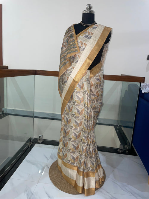Beautiful Tissue Silk Saree with combination of Cream, Silver and Weaving Gold Zari Saree.