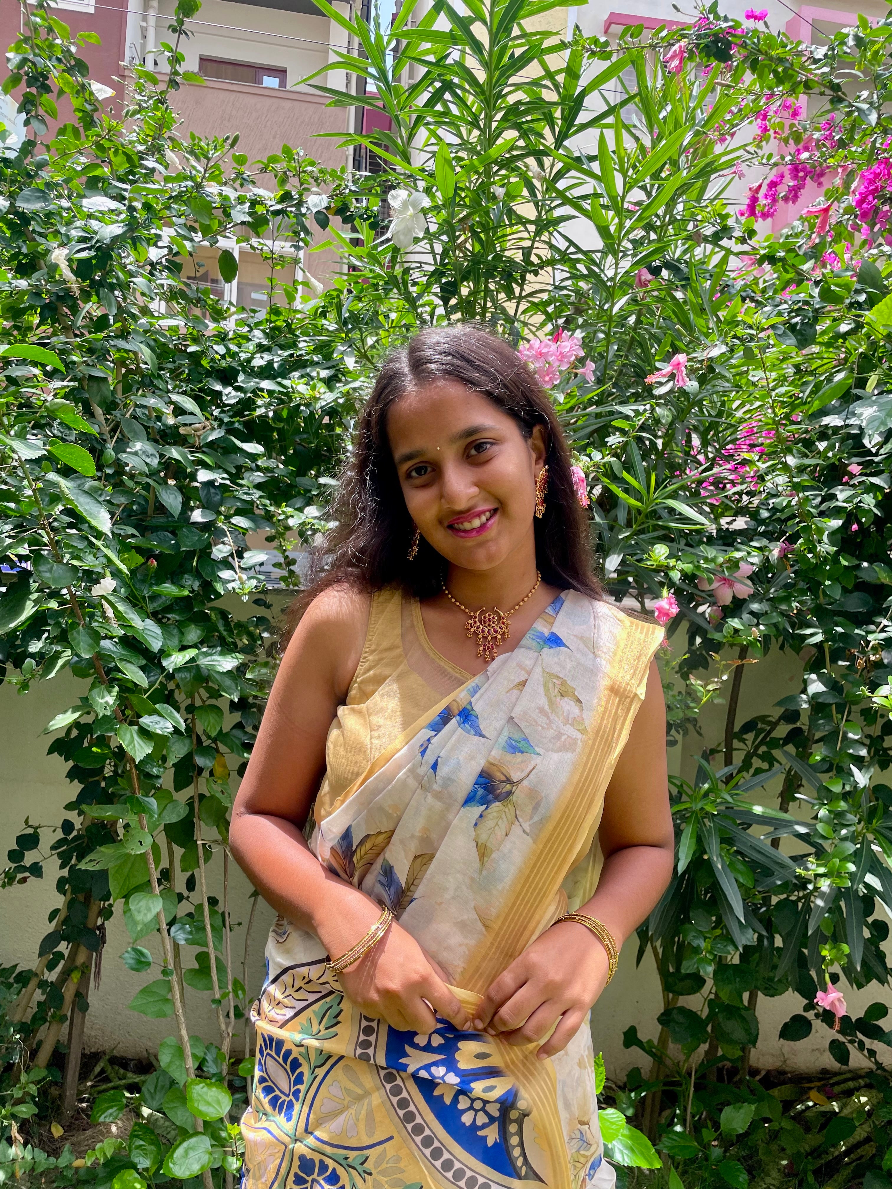Elegant Beige Floral Cotton silk Soft Saree with Royal Blue Accents and Complemented by Golden Border With Tassel Detailing.