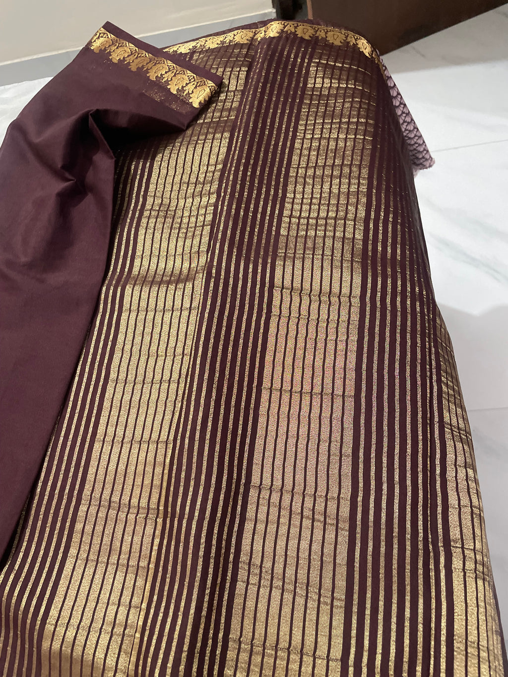 Classic Brown Crepe Semi Silk Saree Featuring Traditional Gold Zari Border