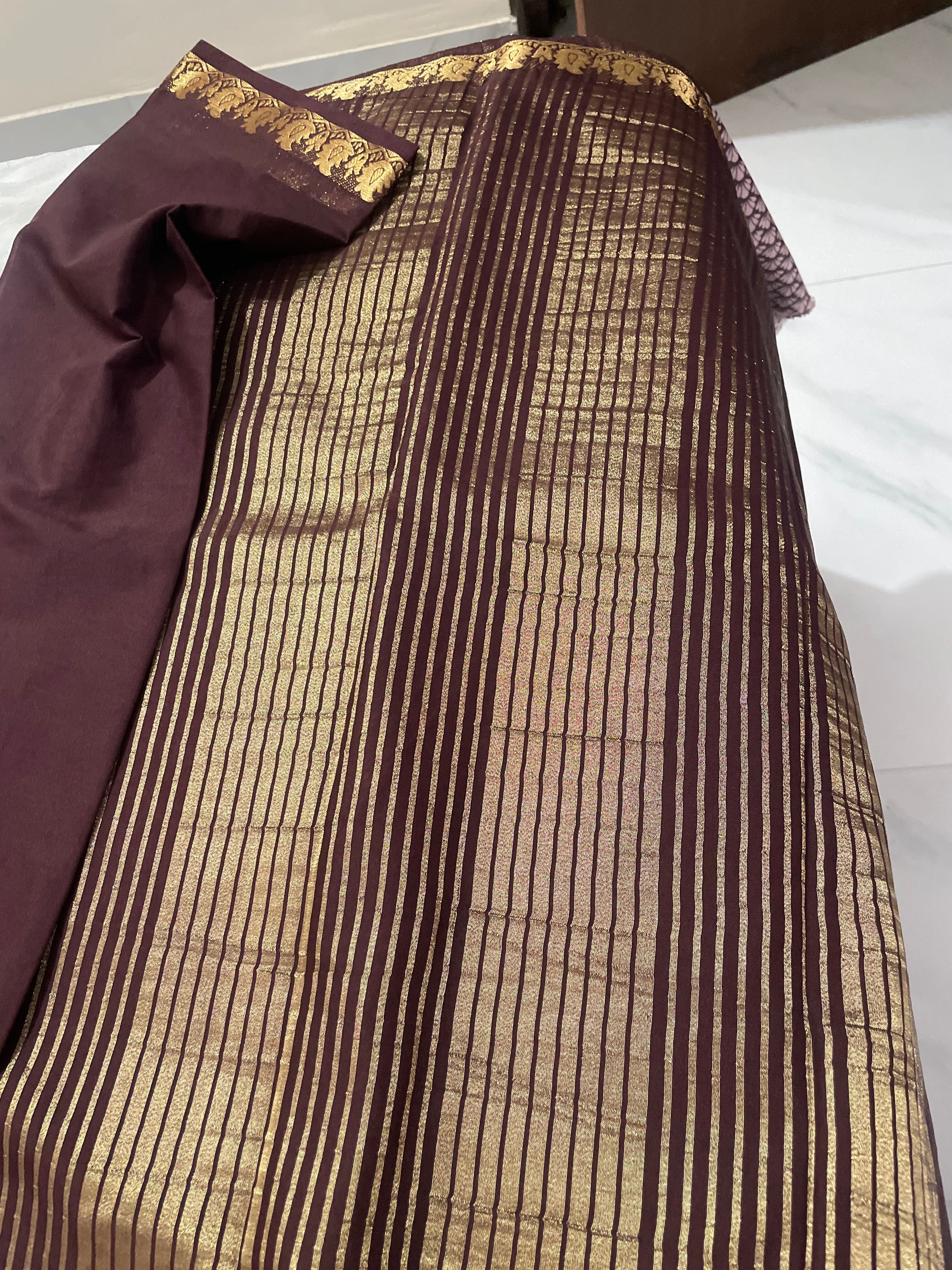 Classic Brown Crepe Semi Silk Saree Featuring Traditional Gold Zari Border