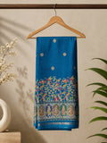 Elegant royal blue saree, beautifully adorned with intricate floral and bird-inspired prints and subtle silver edging.