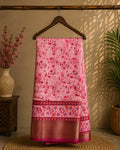 Graceful light pink saree featuring elegant floral prints and a beautifully zari border - Cotton tissue soft Saree