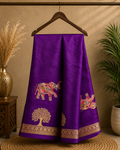 Elegant purple saree featuring elephant and tree motifs that reflect traditional artistry the rich golden woven border- Foil Georjjett jacquard Saree
