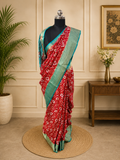 Vibrant Red Saree With Traditional Printed Motifs throughout with Beautiful Mint Green Border Woven Gold Zari Border.