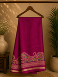 Elegant magenta pink saree featuring a rich plain body with a beautifully embroidered paisley floral border and subtle golden edging.
