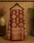 Elegant brown saree featuring beautiful white geometric and floral motifs and a shimmering silver zari border- Cotton tissue soft Saree